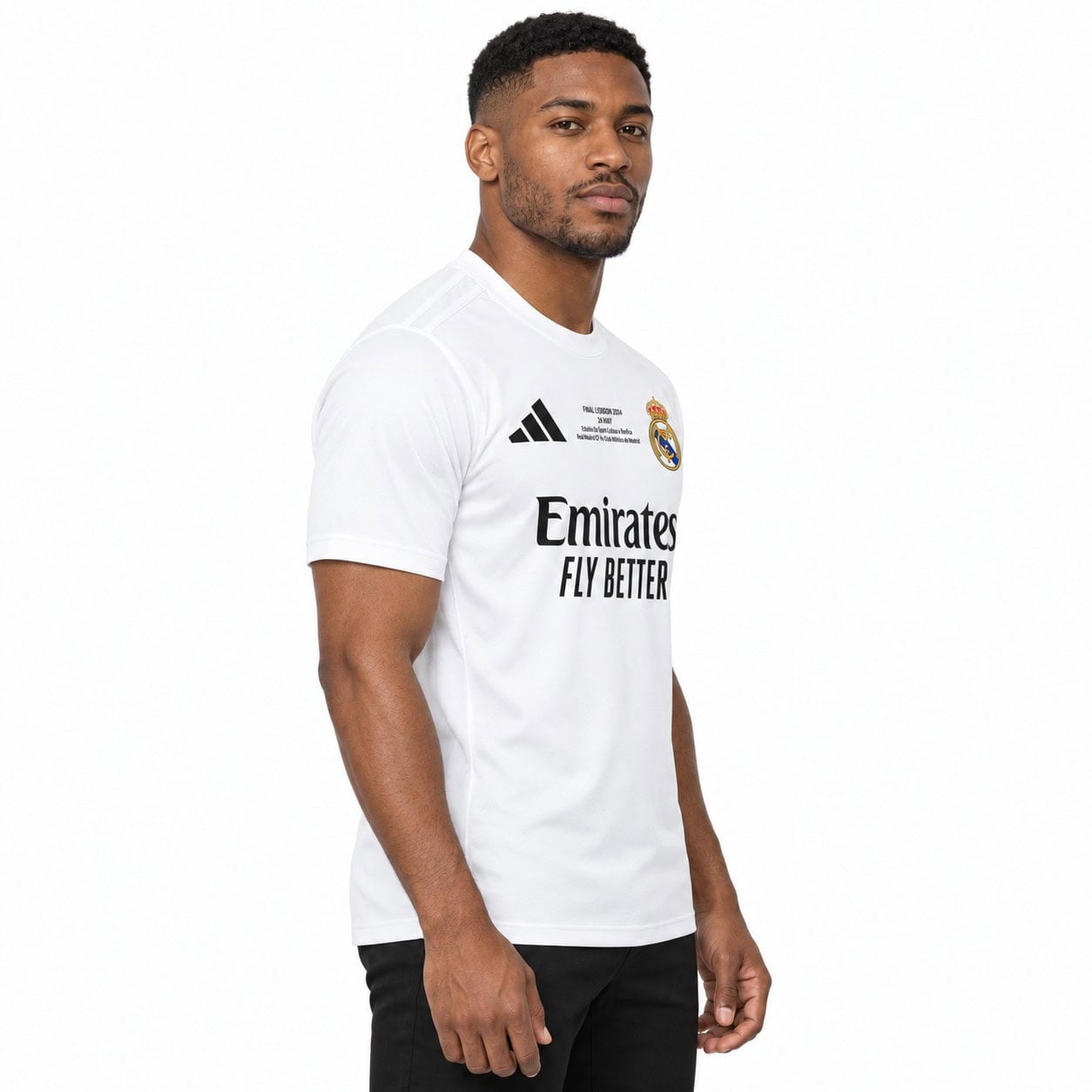 rm-fc-white-shirt-4 - UAE SPORT STORE Side view of the white Real Madrid shirt with crest and black Emirates lettering.