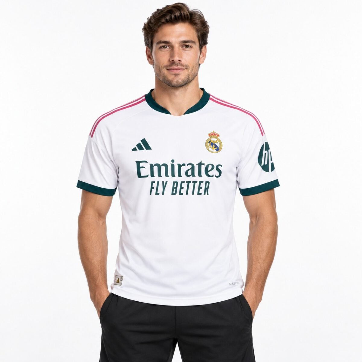 Real Madrid home jersey 2023-24 season white with pink and green accents.