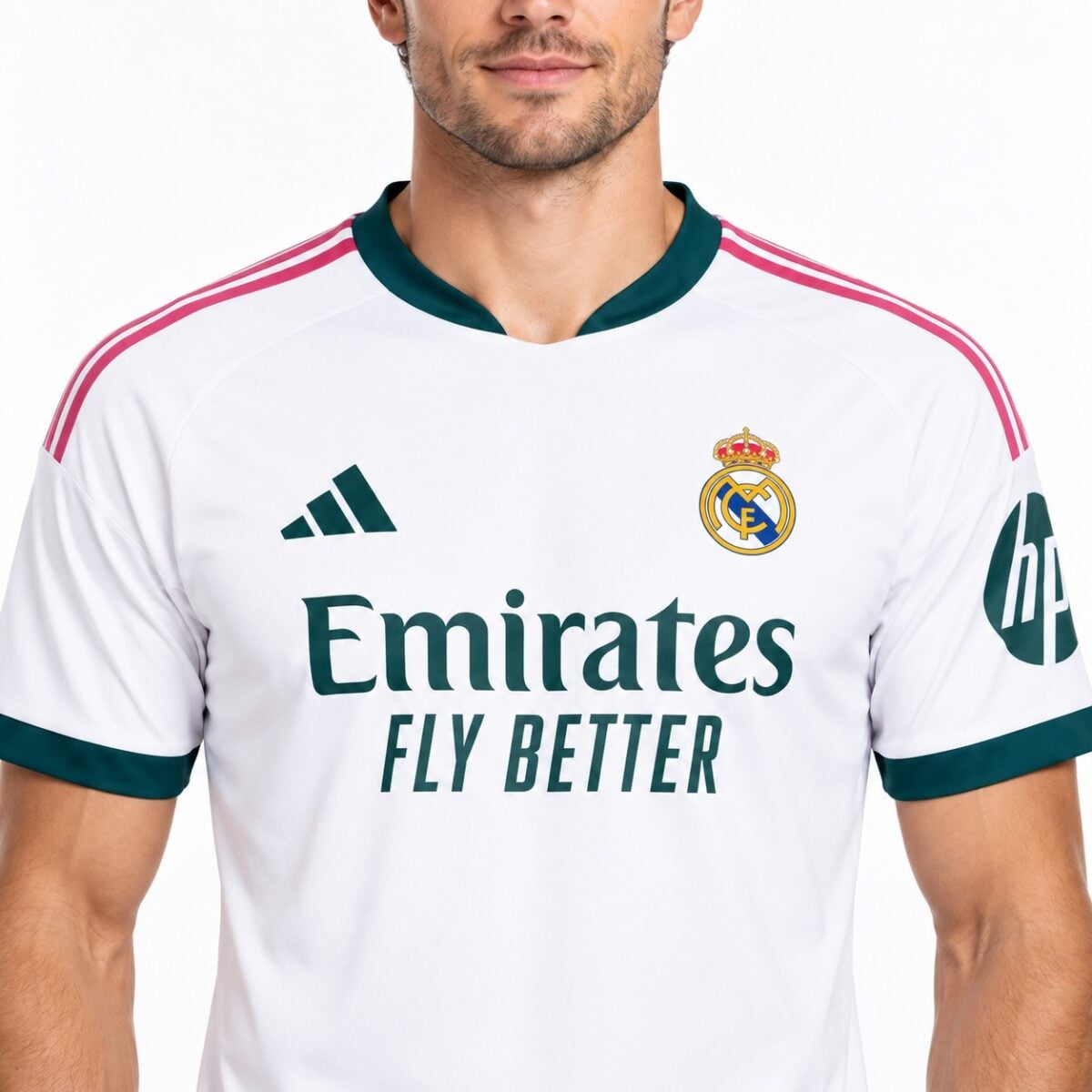 Real Madrid away kit jersey with white, pink, and dark green colors, season 2023/24.