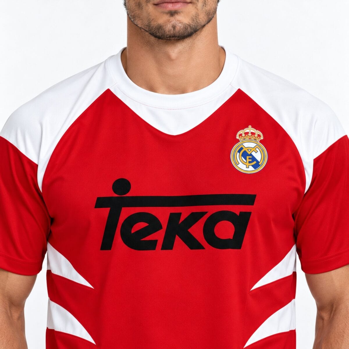 Real Madrid away football jersey with red and white design and Teka sponsor logo.