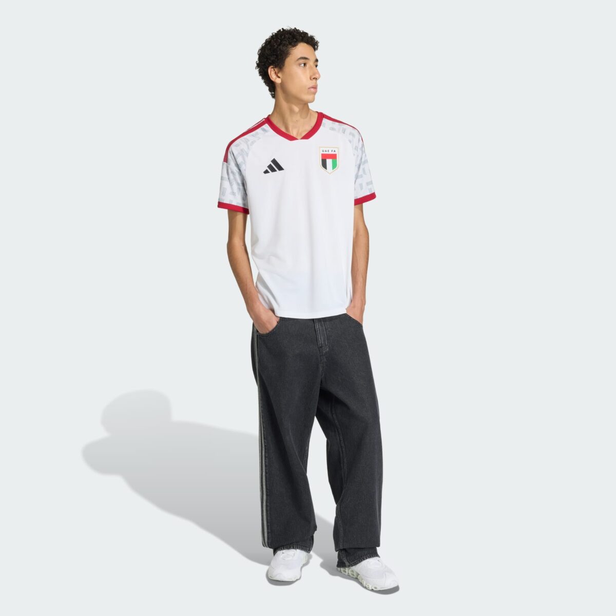 Italy national team football jersey, home kit, white with red and green accents.