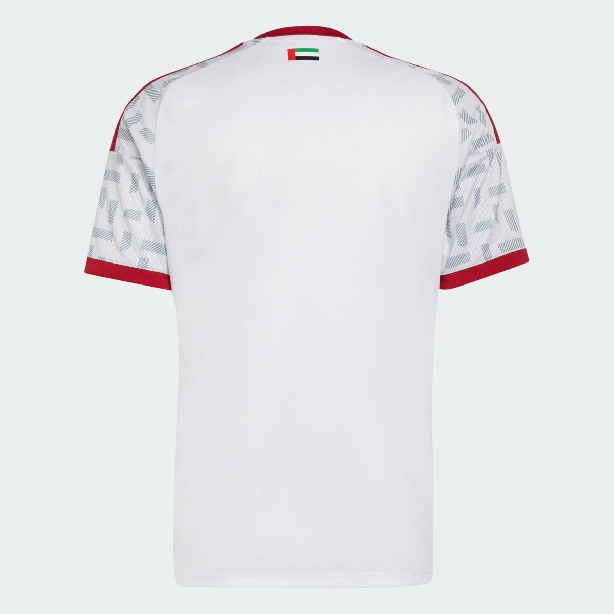 UAE national team football jersey with white body and patterned sleeves.
