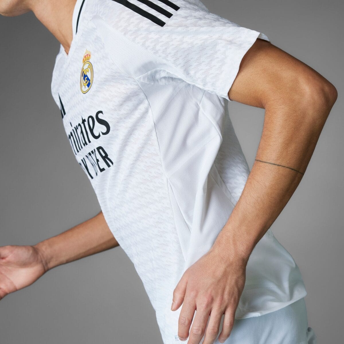 Real Madrid away kit jersey with club crest and sponsor logo.