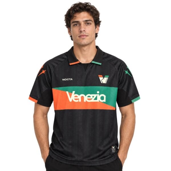 Venezia Home Jersey 2026/27 front – black NOCTA shirt with green and orange chest band