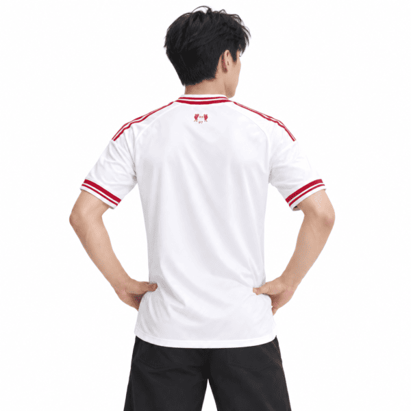 Liverpool away jersey 2026/27 with red and white colors, back view.