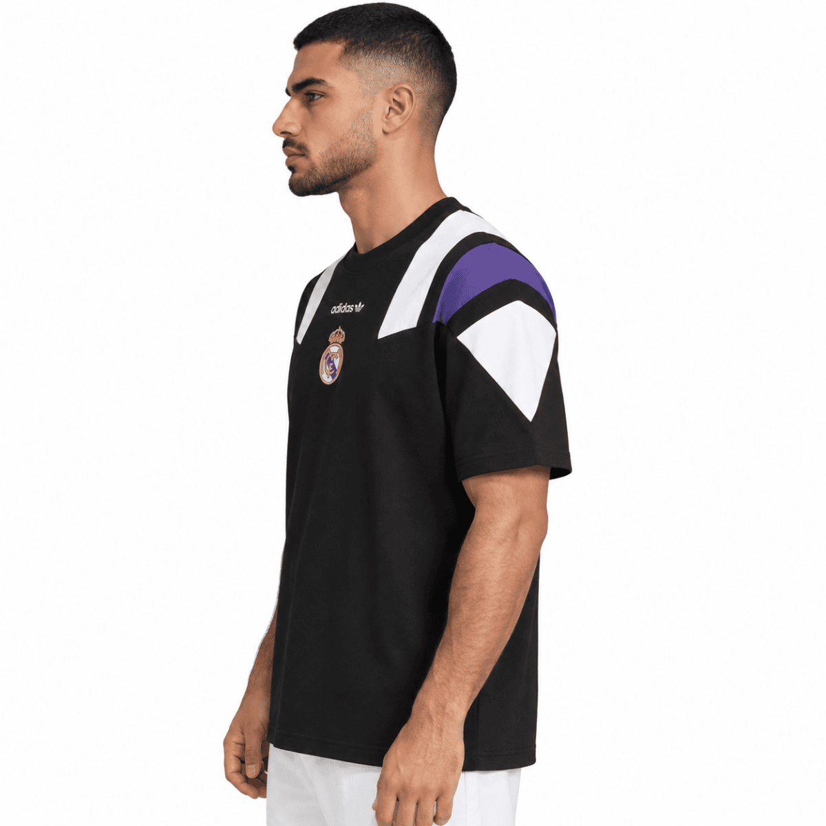 Real Madrid football jersey with black, white, and purple colors, Adidas logo, and club crest.