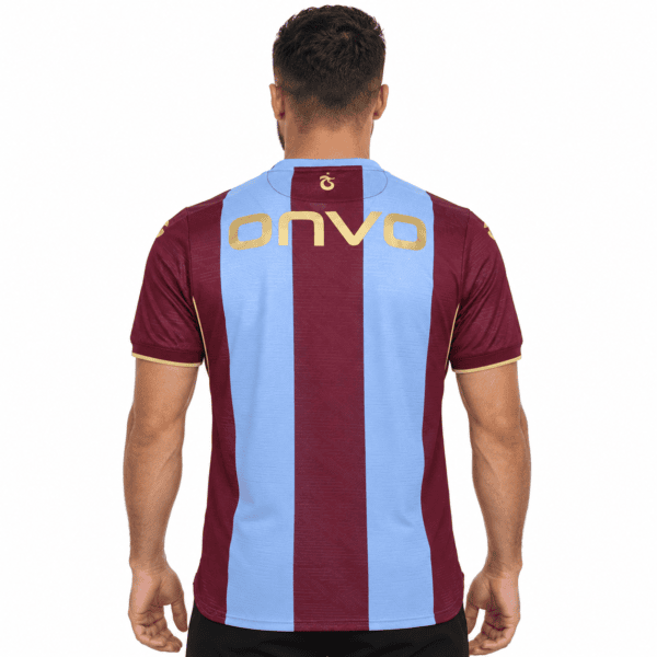 Trabzonspor home football jersey with maroon and light blue vertical stripes.