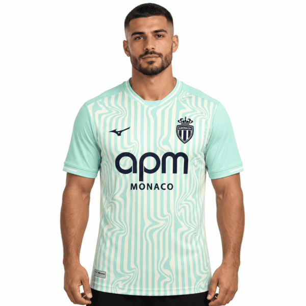 AS Monaco third jersey 2026/27 with mint green and white pattern, club crest, and sponsor logo.