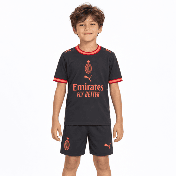 Kids AC Milan third kit 2026/27 black with red accents and club logo.