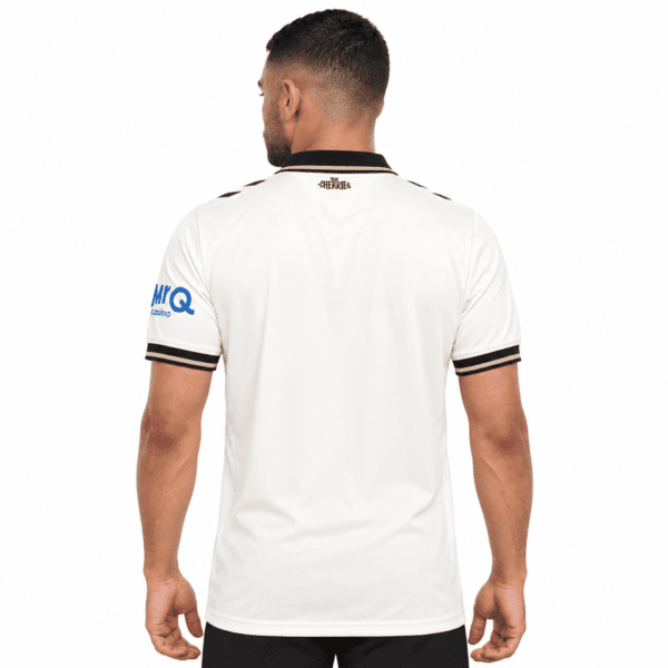 A man wearing AFC Bournemouth third jersey 2026/27 in white with black accents.