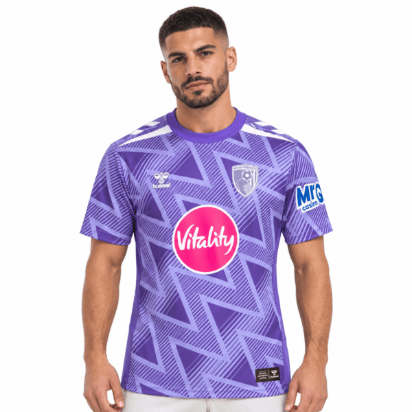 A football player wearing AFC Bournemouth away jersey 2026/27 in purple with geometric pattern.