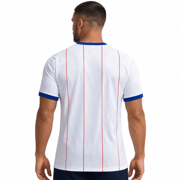White Chelsea shirt with red pinstripes and blue collar and cuffs, full rear view on model