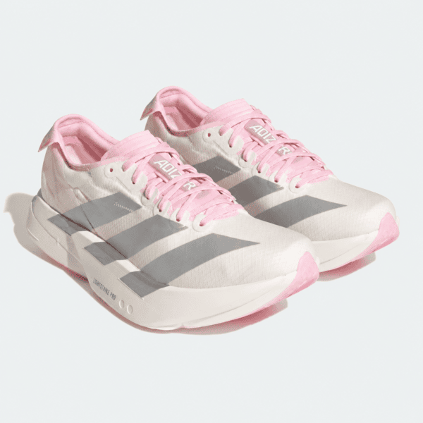White and pink Adidas running shoes with gray stripes and pink laces.