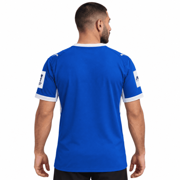 Blue Al Hilal home jersey 2026/27 with white accents, back view.