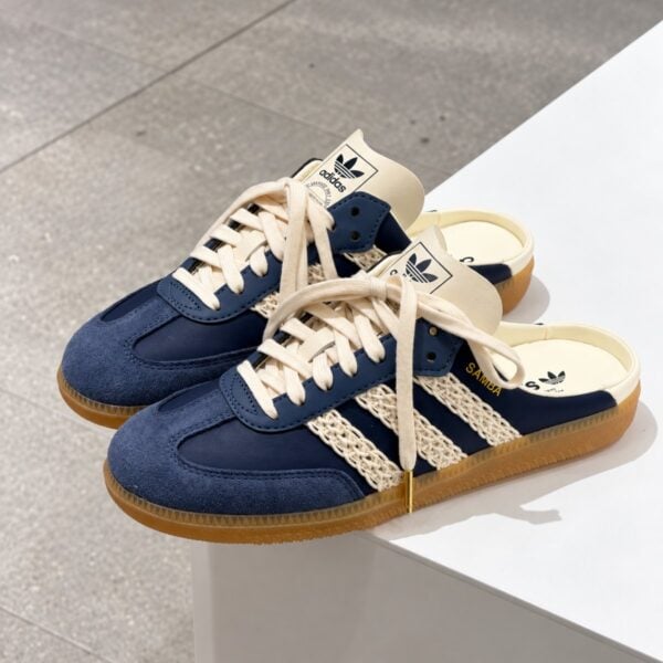 adidas Samba Mule navy angled view showing the woven cream three stripes and gold SAMBA script