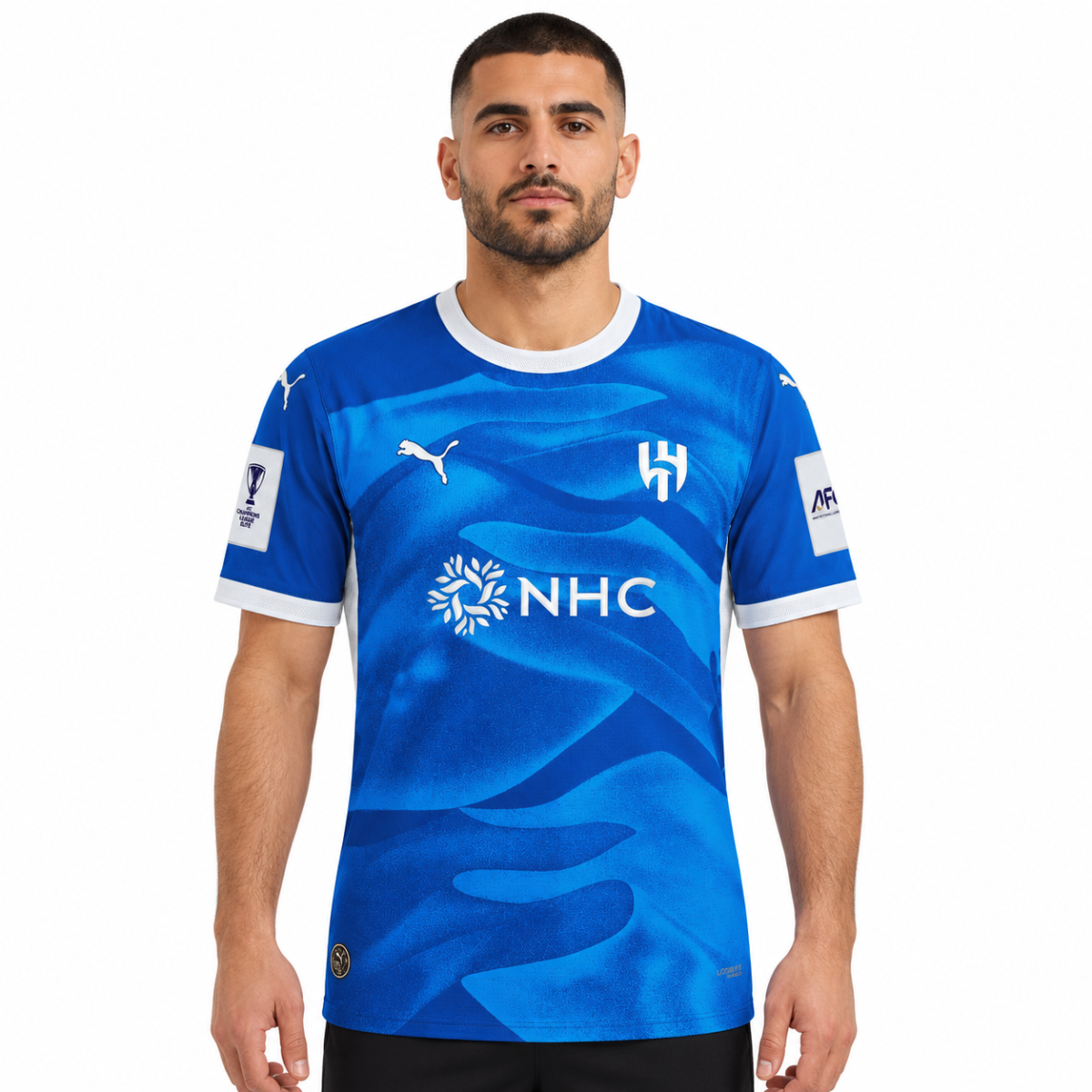 Al Hilal home football jersey 2026/27 in blue with white accents and sponsor logo.