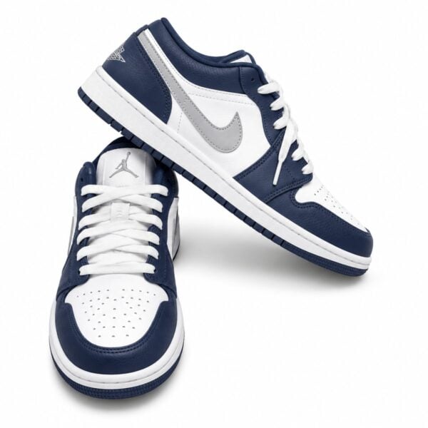 Air Jordan 1 Low Midnight Navy pair angled with Jumpman tongue label