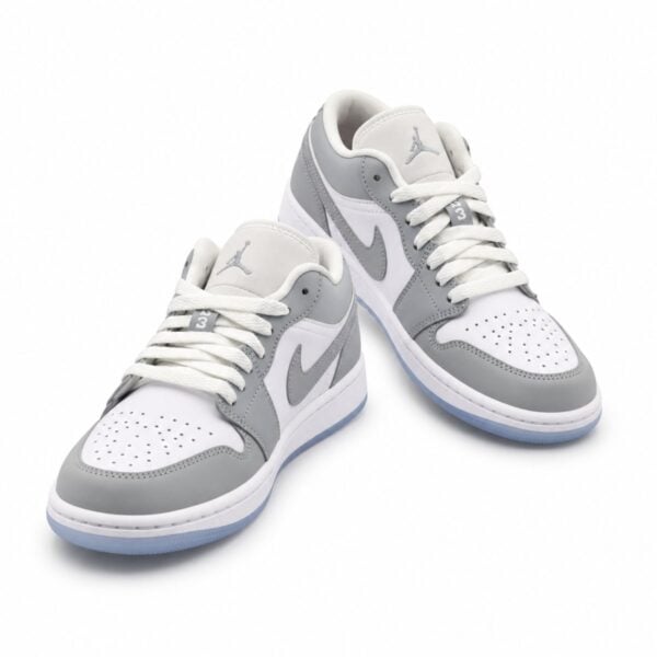 Air Jordan 1 Low Wolf Grey Aluminium pair angled front view with Jumpman tongue