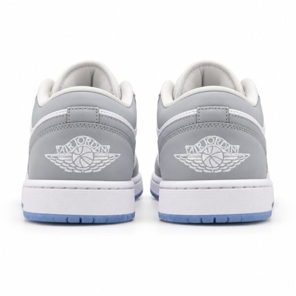 Air Jordan 1 Low Wolf Grey Aluminium heel view with embroidered white Wings logo