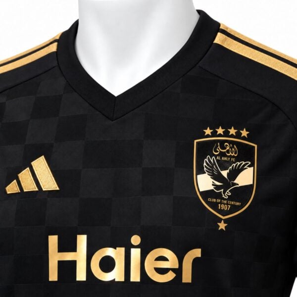Al Ahly away player version jersey close-up of the gold crest four stars and embroidered gold maker mark