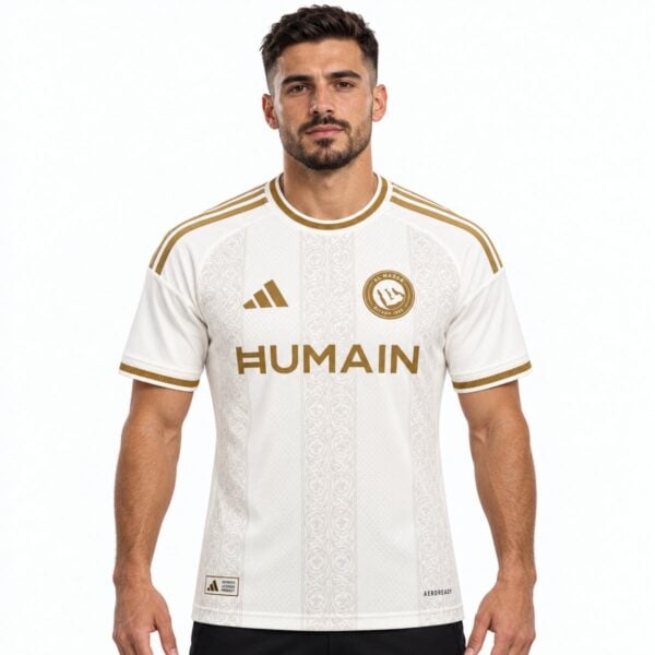 Al Nassr third jersey 2026 2027 off white front view with gold crest and tonal arabesque bands - UAE SPORT STORE Al Nassr third jersey 2026 2027 off white front view with gold crest and tonal arabesque bands