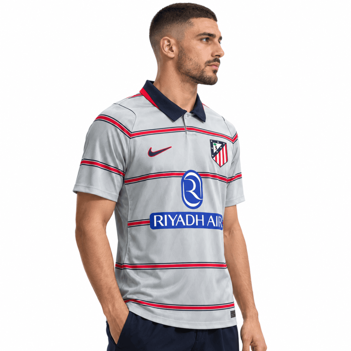 Atletico Madrid third jersey 2026/27 with club crest and Riyadh Air sponsor.