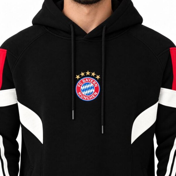 Bayern Munich black hoodie close-up of embroidered FC Bayern Munchen crest with five gold stars and cream chest sweep