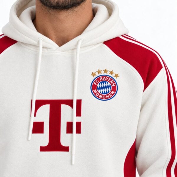 Bayern Munich hoodie close-up of embroidered FC Bayern Munchen crest with five gold stars and red chest mark