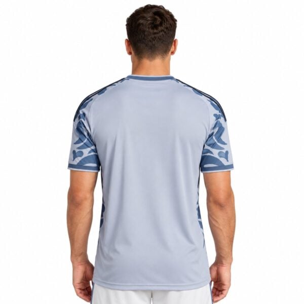 Eintracht Frankfurt third jersey back view pale blue with floral print on the sides and black shoulder stripes