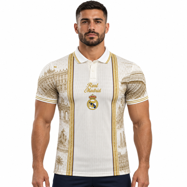 f6097337-f81f-4f8b-b9a9-d9587d69b83f - UAE SPORT STORE Real Madrid polo jersey with gold accents and club crest, season 2026/27.
