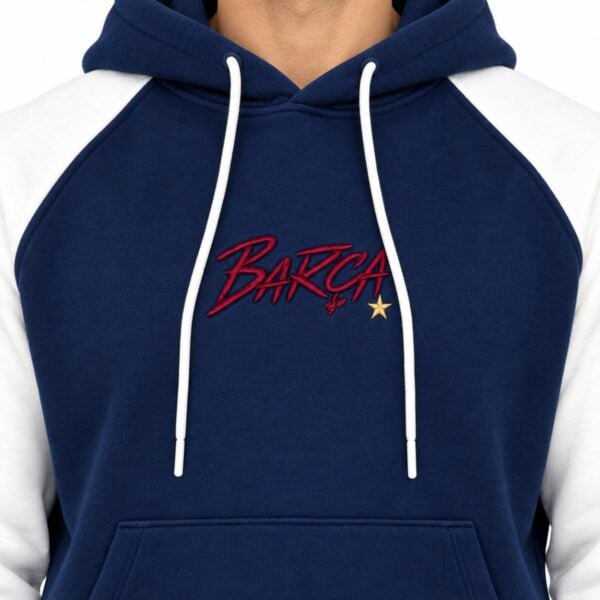 Barcelona hoodie close-up of crimson embroidered BARCA script with gold star on navy fleece