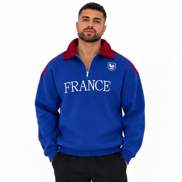 France quarter zip polo sweatshirt royal blue front view with burgundy collar rooster shield and FRANCE wordmark - UAE SPORT STORE France quarter zip polo sweatshirt royal blue front view with burgundy collar rooster shield and FRANCE wordmark