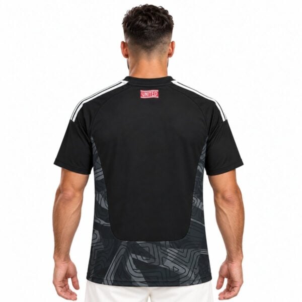 Manchester United home goalkeeper jersey back view black with grey maze print and red UNITED tab