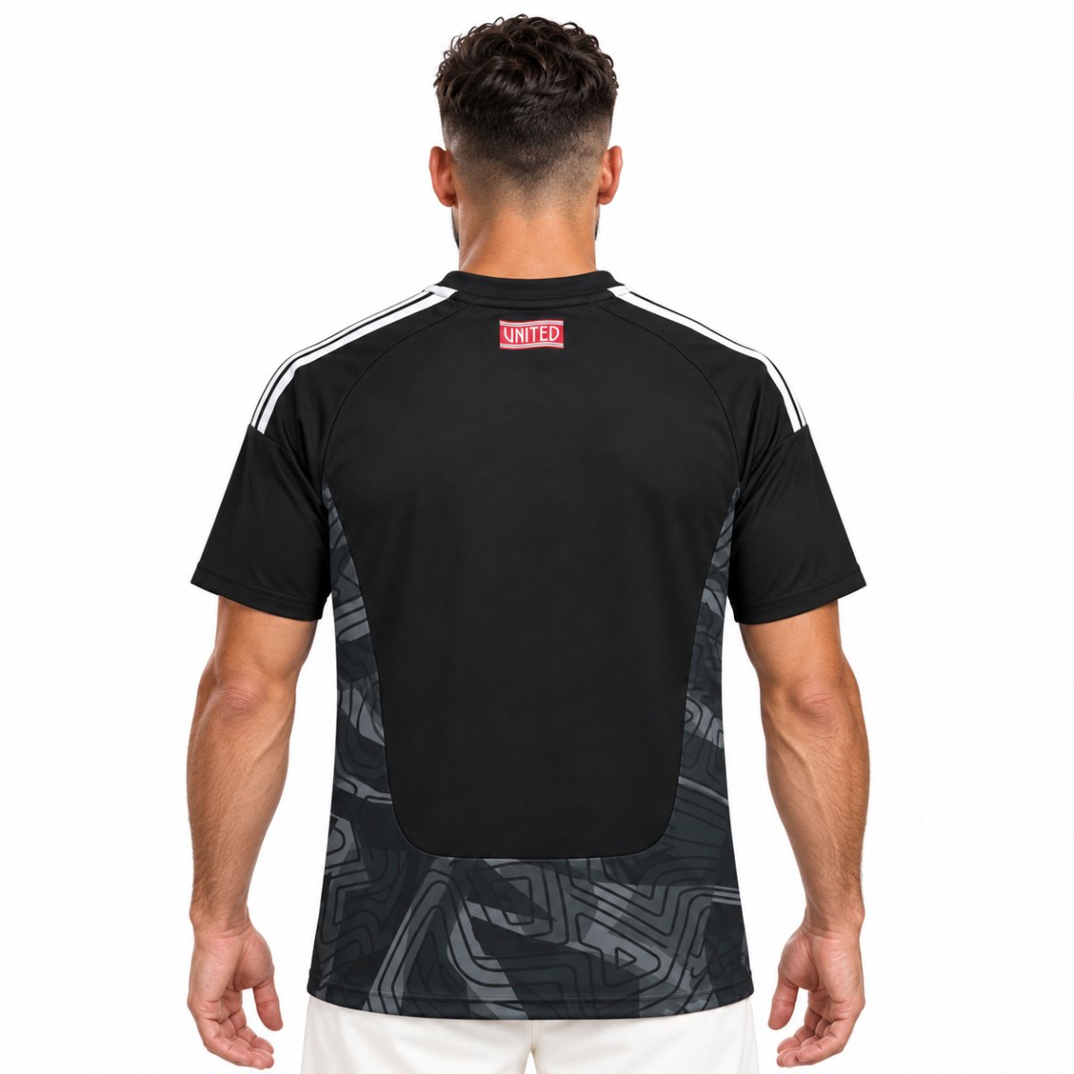 Manchester United home goalkeeper jersey back view black with grey maze print and red UNITED tab - UAE SPORT STORE Manchester United home goalkeeper jersey back view black with grey maze print and red UNITED tab