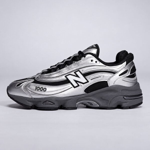 New Balance 1000 silver and black sneaker side profile with ABZORB midsole and white N logo - UAE SPORT STORE New Balance 1000 silver and black sneaker side profile with ABZORB midsole and white N logo