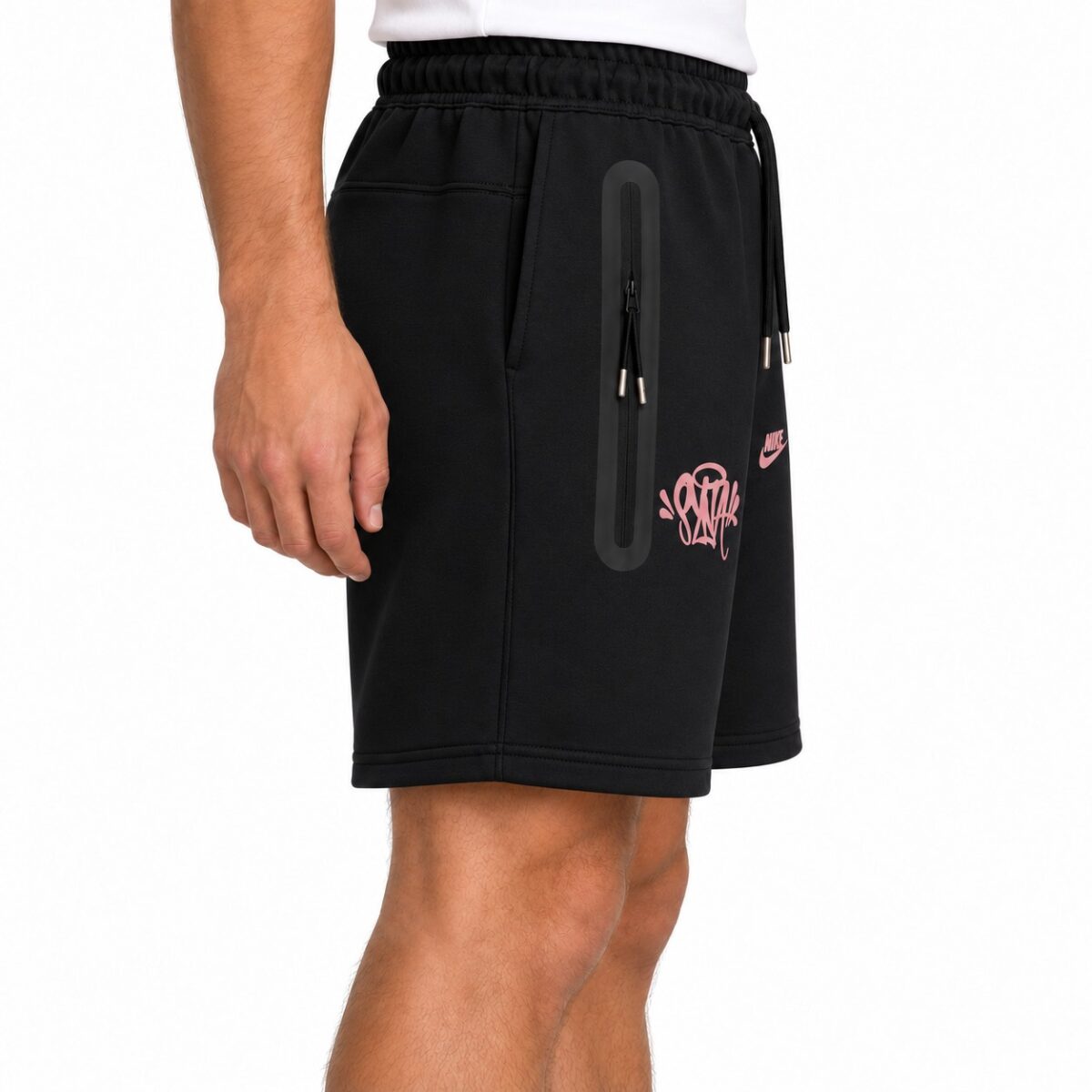 Black sports shorts with pink logo and zip pocket for UAE football fans.