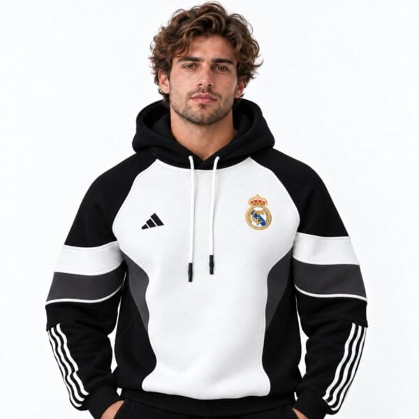 Real Madrid colour block hoodie black white front view - UAE SPORT STORE Real Madrid colour block hoodie black white front view