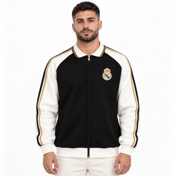 Real Madrid retro zip track jacket black and cream front view with gold sleeve taping and embroidered crest - UAE SPORT STORE Real Madrid retro zip track jacket black and cream front view with gold sleeve taping and embroidered crest