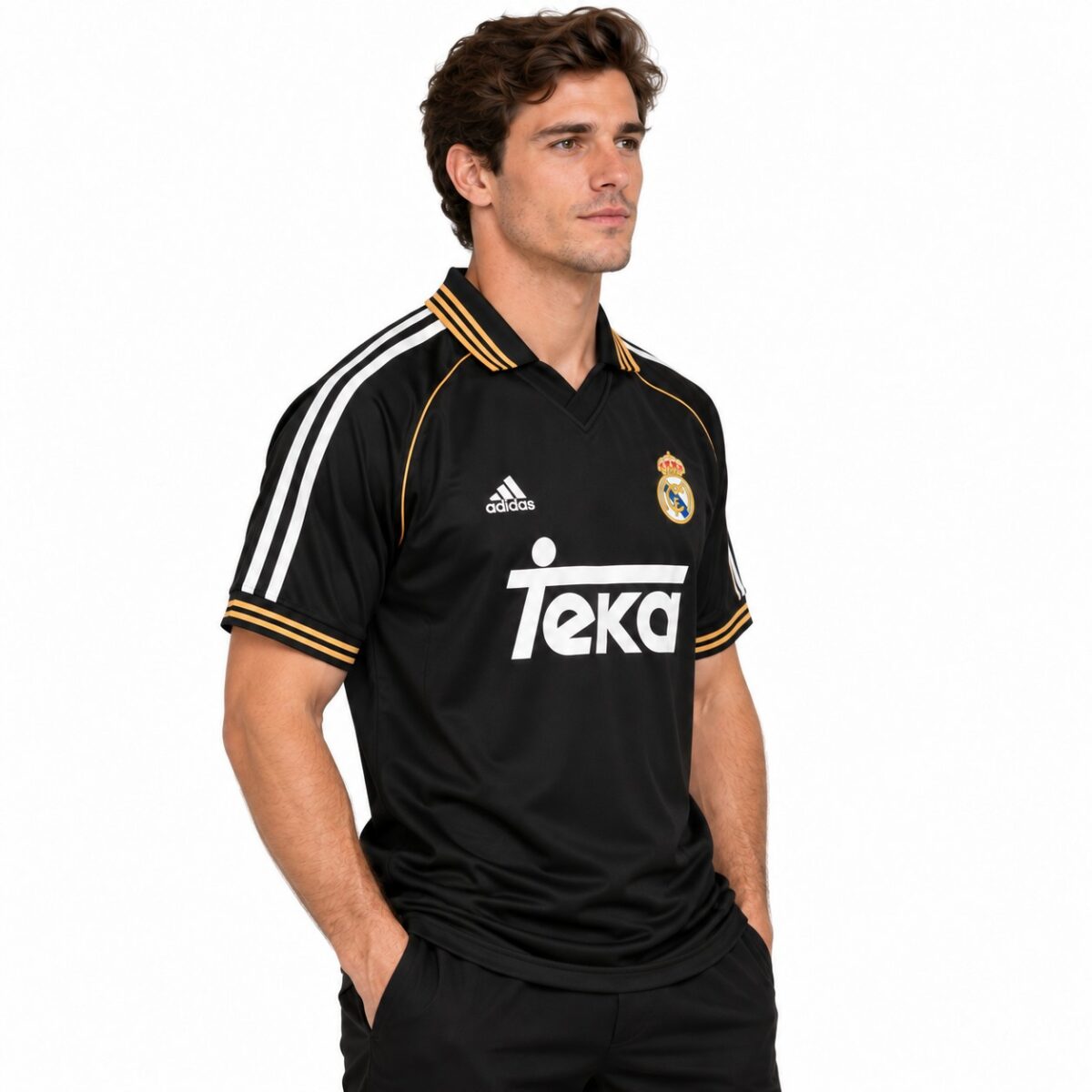 Real Madrid black away football jersey with gold accents and Teka sponsor logo.