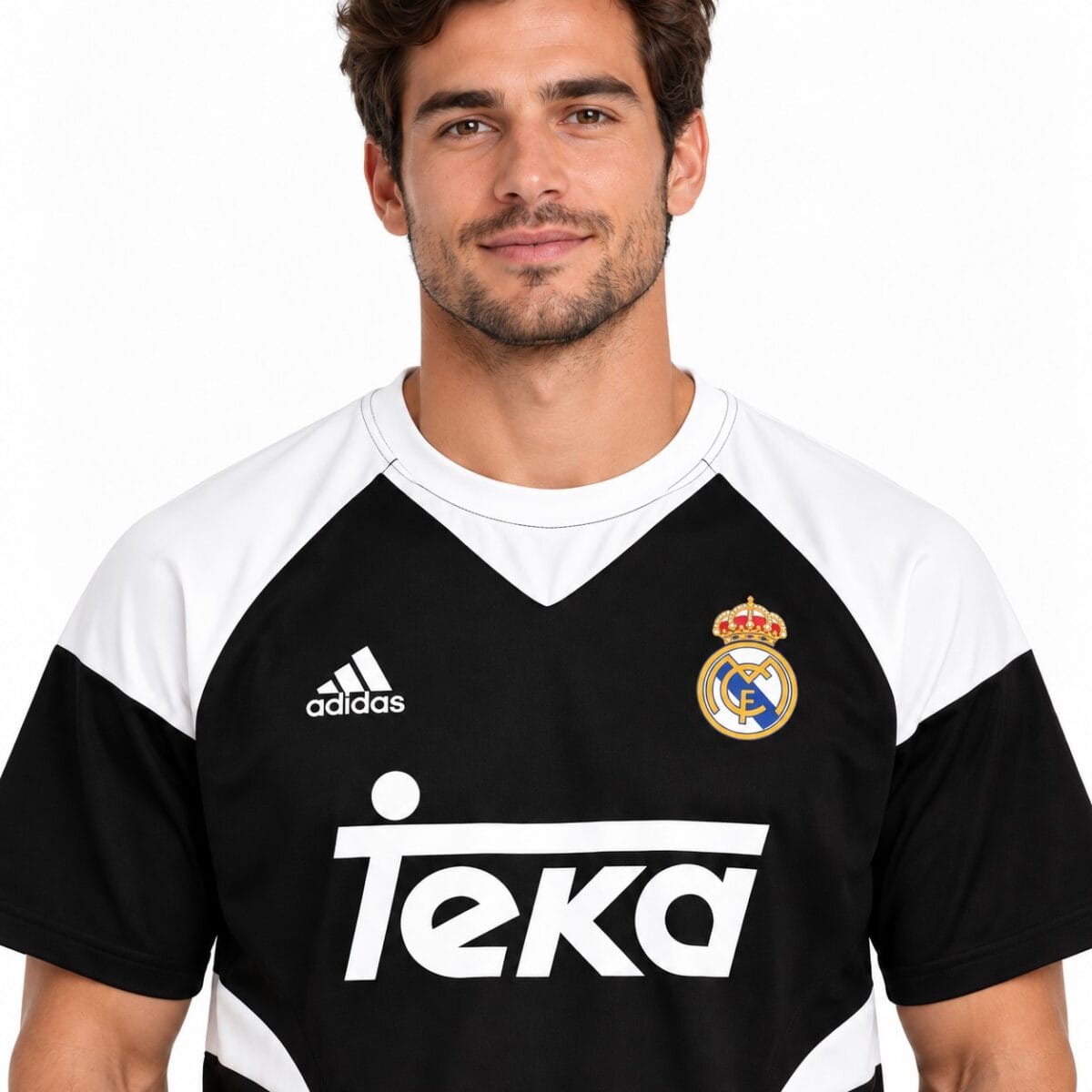 Real Madrid away football jersey black and white with club crest and Adidas logo.