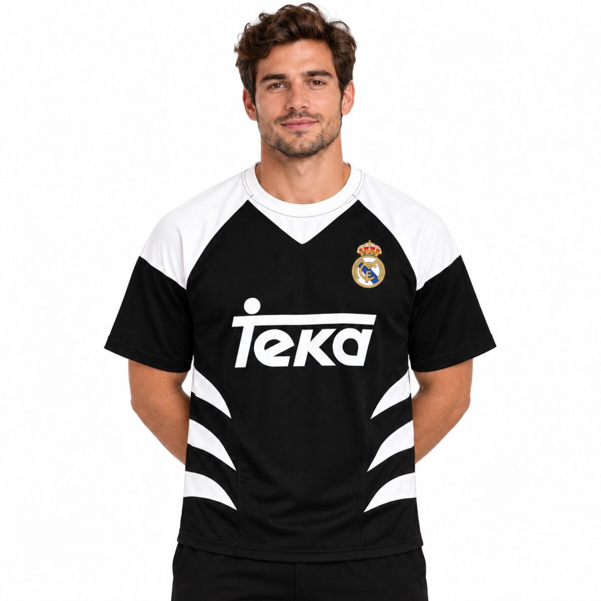 Real Madrid away kit jersey with black and white design and club crest.