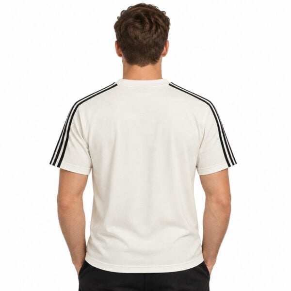 White football jersey with black stripes on shoulders, back view.