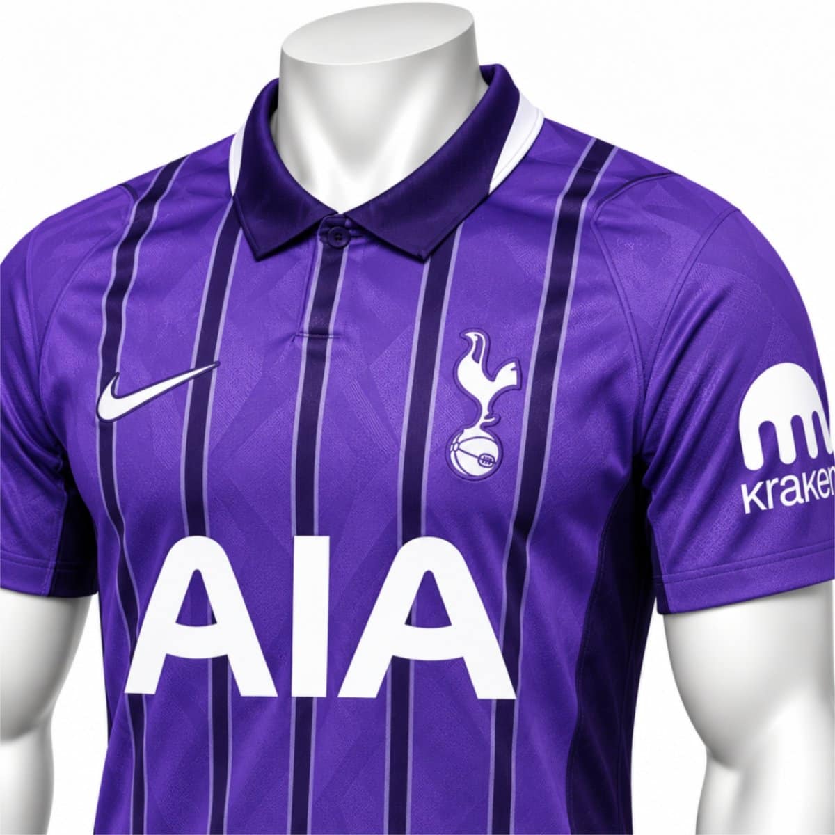 Tottenham third jersey close-up of the white cockerel crest and purple polo collar with white trim - UAE SPORT STORE Tottenham third jersey close-up of the white cockerel crest and purple polo collar with white trim