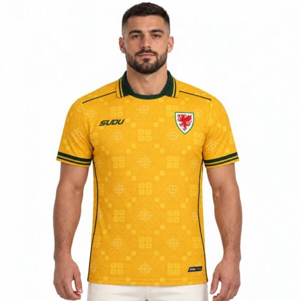 Wales away jersey 2026 2027 yellow front view with green polo collar and red dragon crest