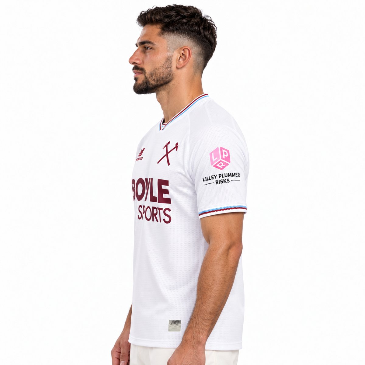 West Ham United away jersey 2026 2027 angled view white perforated mesh with sleeve sponsor - UAE SPORT STORE Angled view of the white West Ham United shirt with claret BOYLE SPORTS lettering and collar trim.