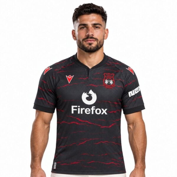 Wrexham away jersey 2026 2027 black front view with red mountain ridge print and club crest - UAE SPORT STORE Wrexham away jersey 2026 2027 black front view with red mountain ridge print and club crest