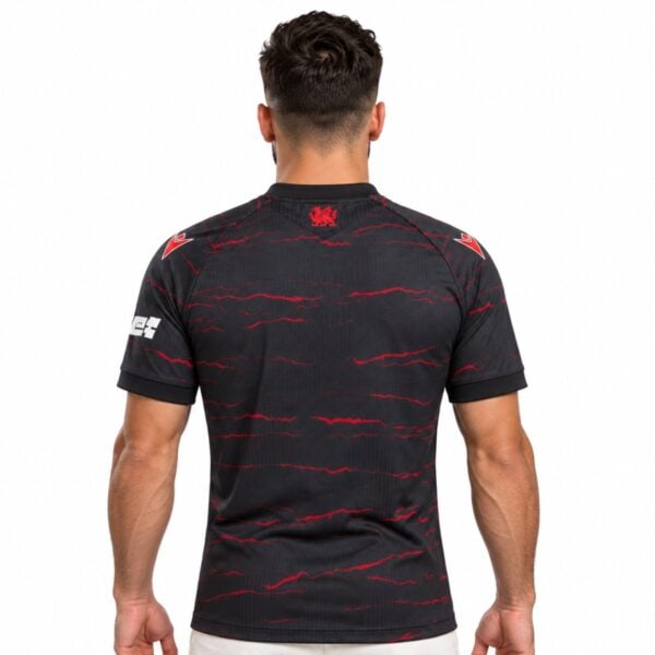 Wrexham away jersey 2026 2027 back view black with red ridge lines and Welsh dragon below the collar