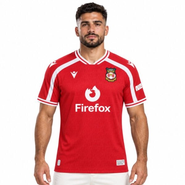 Front of the red Wrexham shirt with white Firefox lettering and sleeve trim.