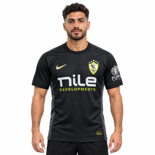 Zamalek away jersey 2026 2027 black front view with neon yellow club shield and five white stars - UAE SPORT STORE Zamalek away jersey 2026 2027 black front view with neon yellow club shield and five white stars