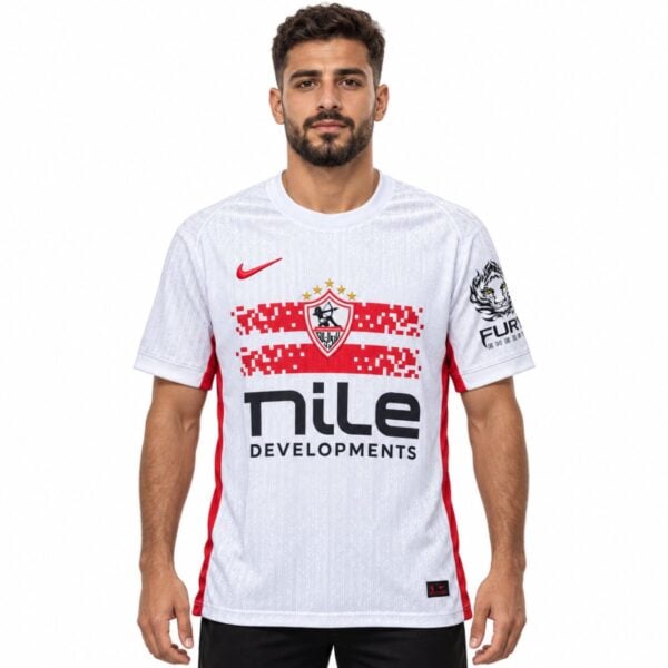 Zamalek home jersey 2026 2027 white front view with pixelated red chest bands and club shield - UAE SPORT STORE Zamalek home jersey 2026 2027 white front view with pixelated red chest bands and club shield